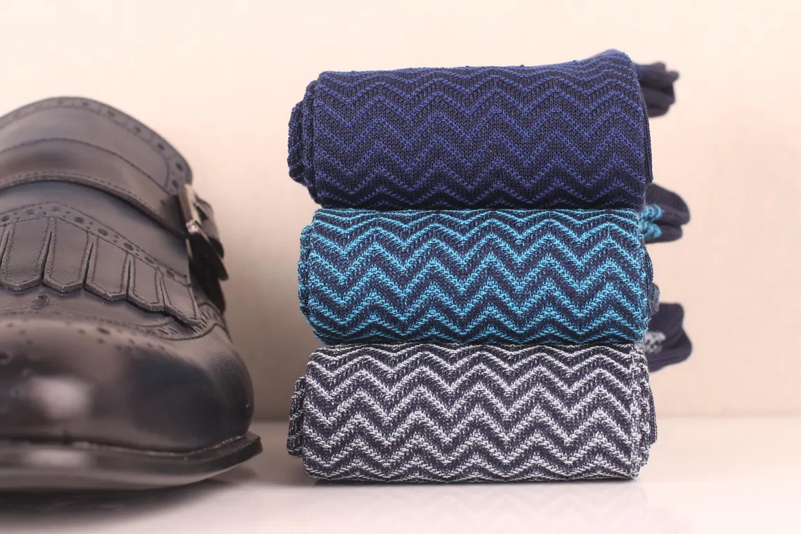 folded navy blue ribbed dress socks premium cotton